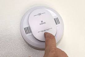 smoke detector being tested