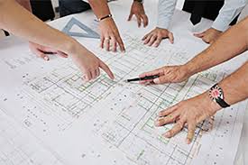 generic picture of plans being reviewed