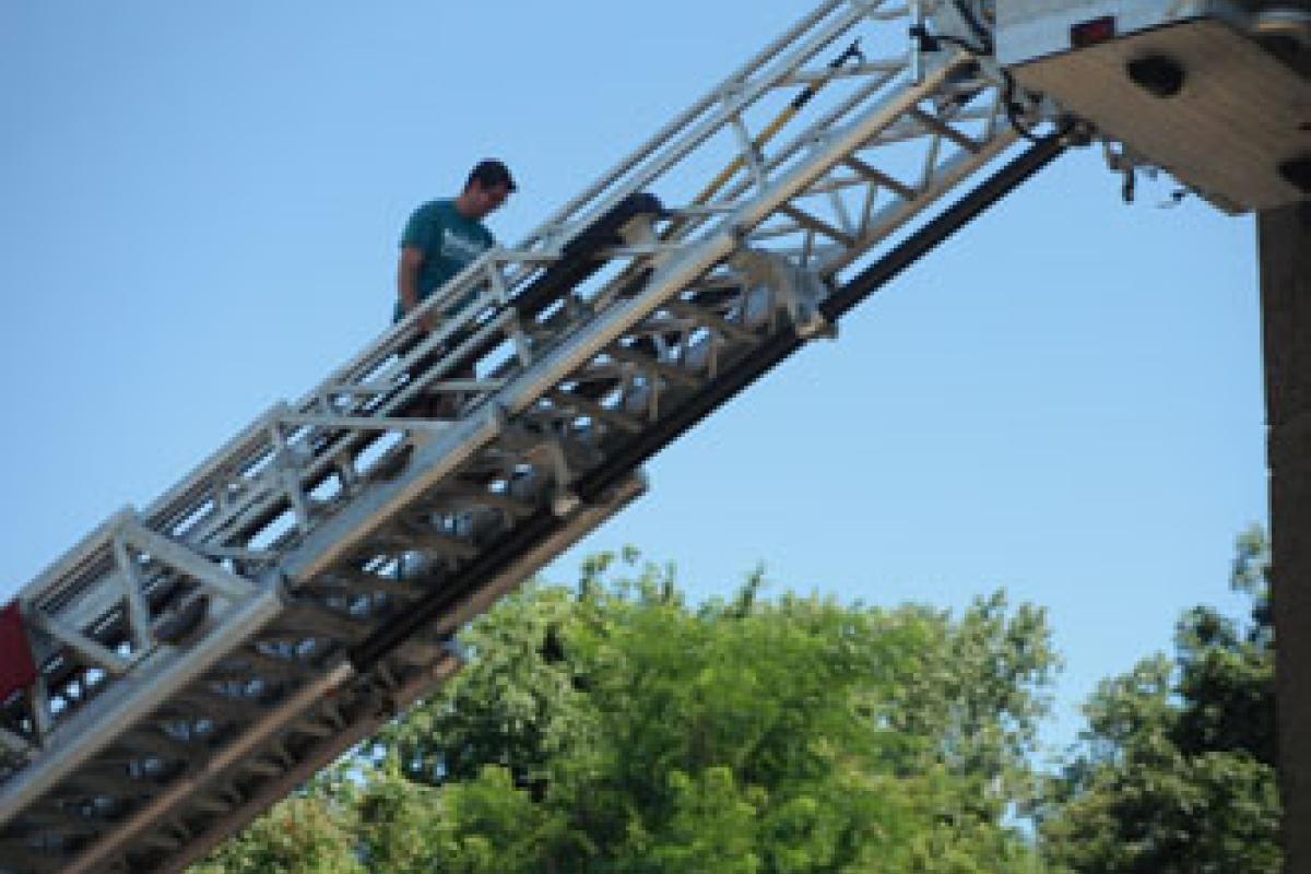 Campers Climb Aerial Ladder