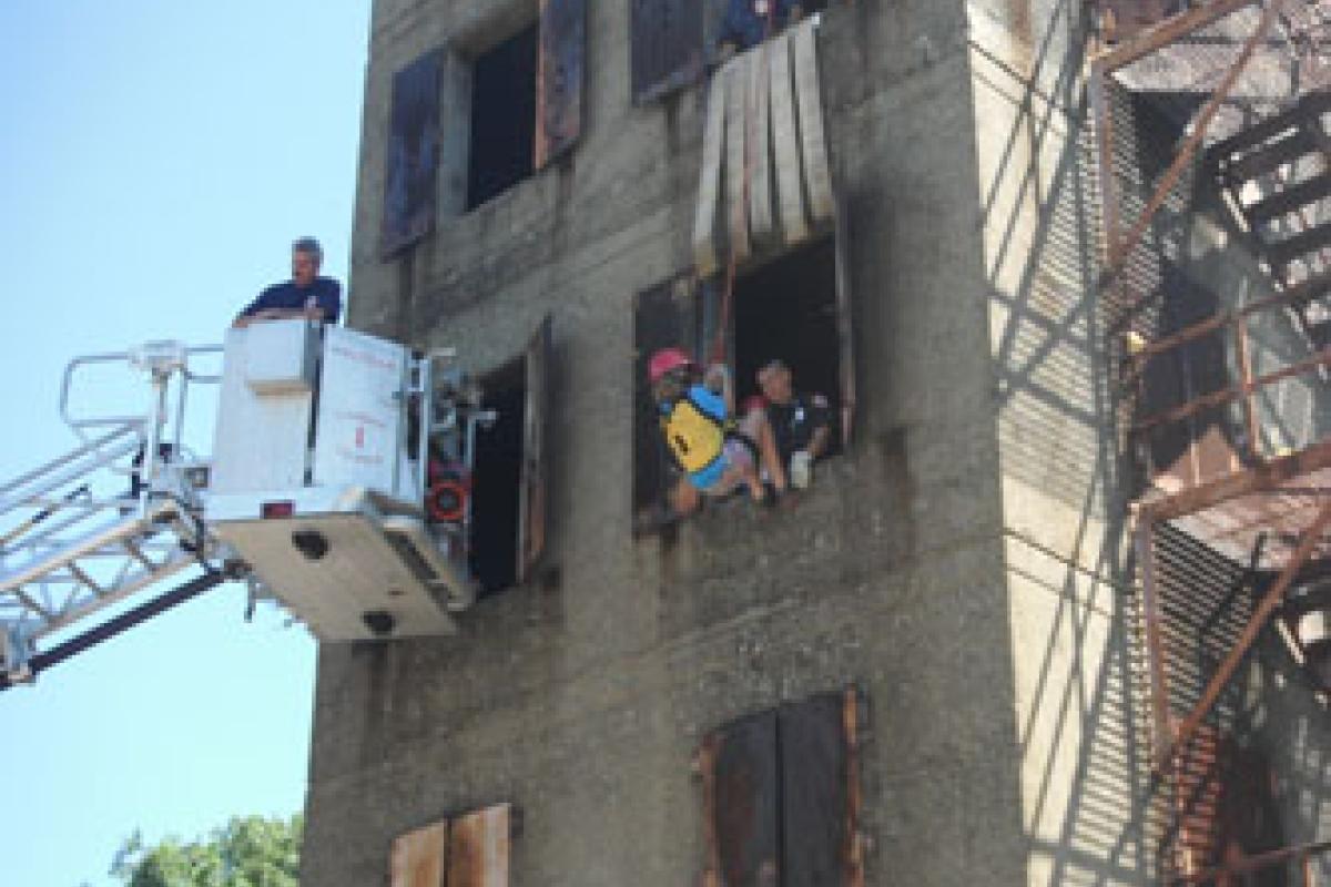 Campers Rappel down Drill Tower