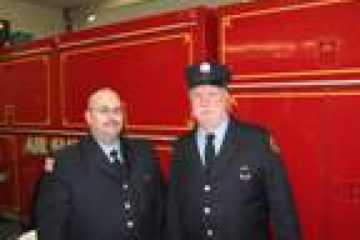 Firefighter Deptula and Firefighter Joe Corbett